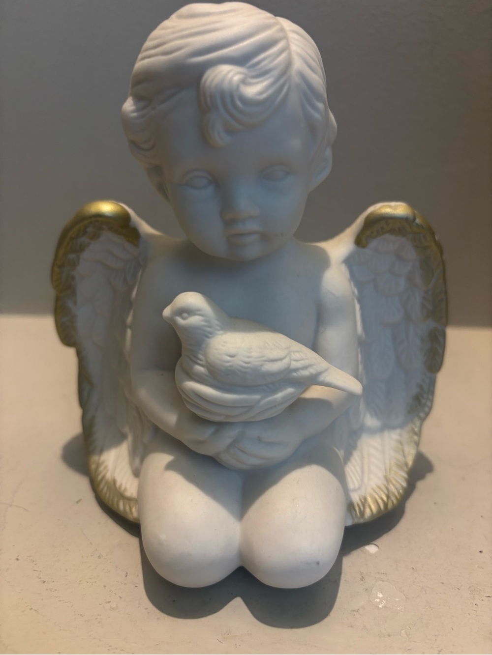 Kneeling Cherub Angel ceramic Figurine with Bird nest -White gold accents  5x7